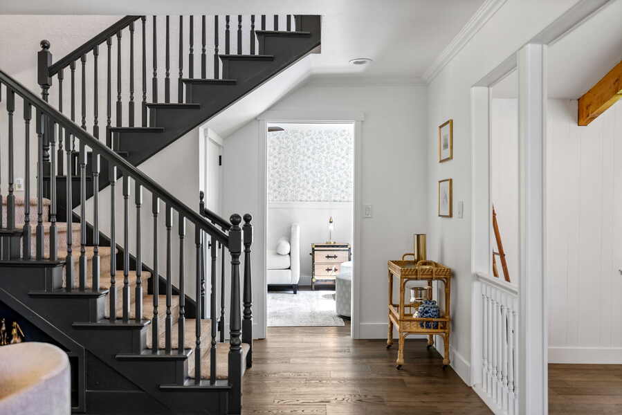Staircase with jute runner and champagne cart