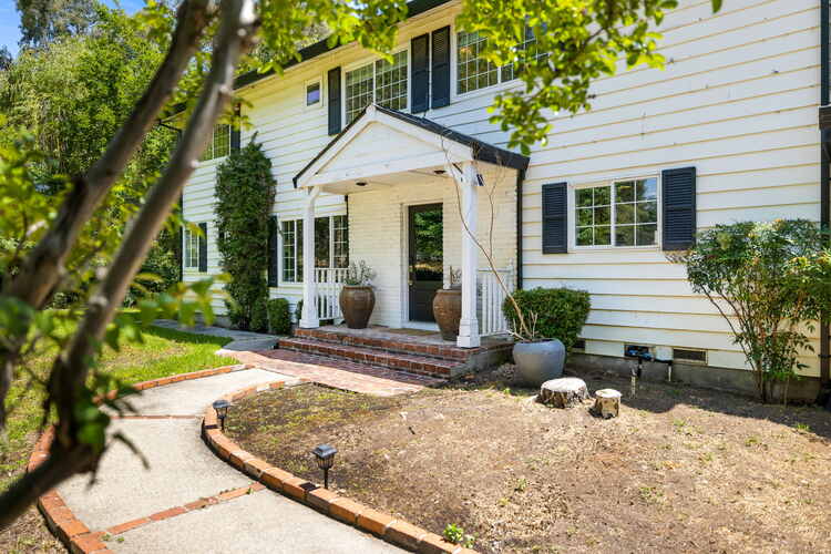 Front door through heritage oak