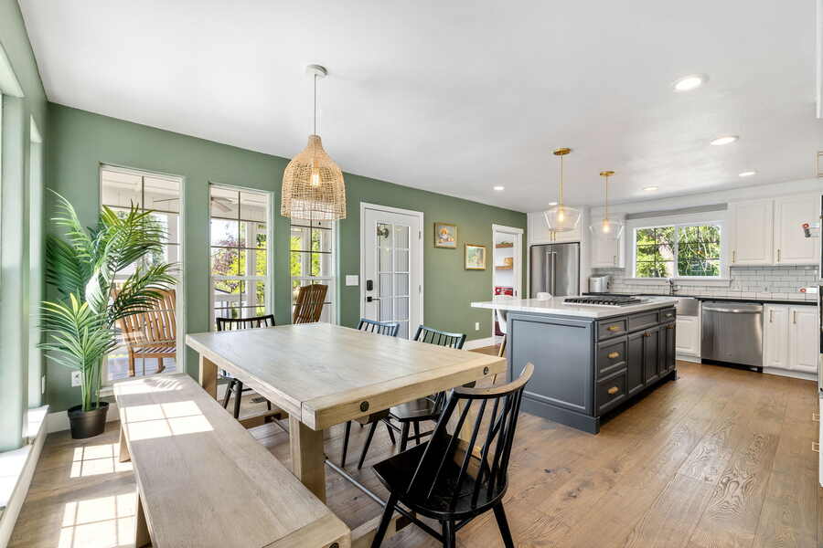 Sage green kitchen and dining