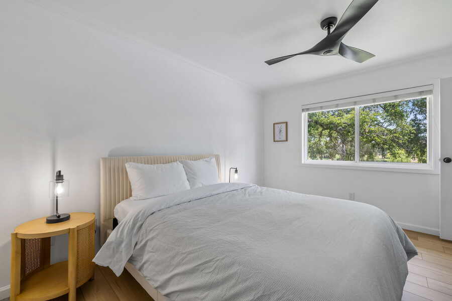 Queen bedroom with oak tree view