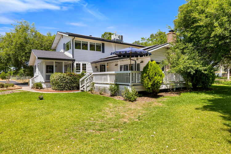 Farmhouse from backyard